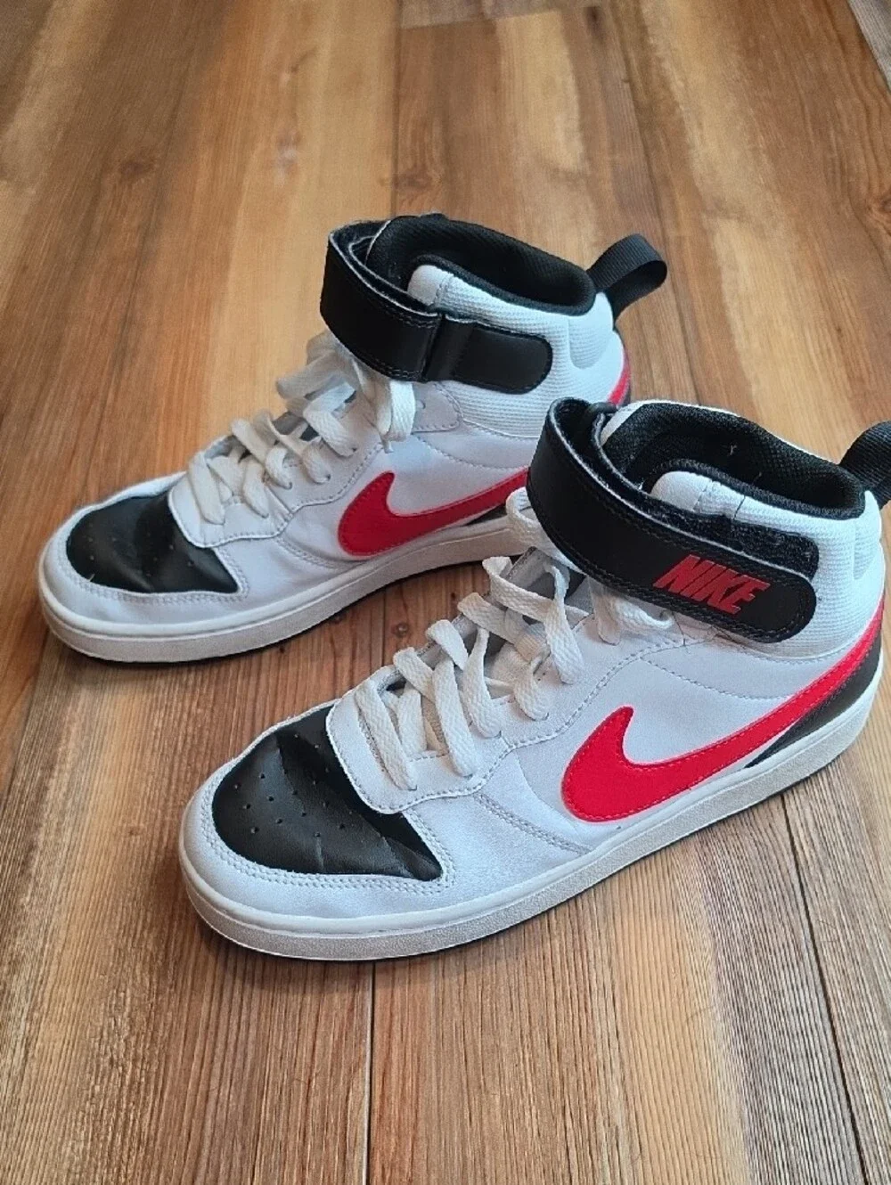 Nike Kids White High-Top Sneakers with Black and Red Accents